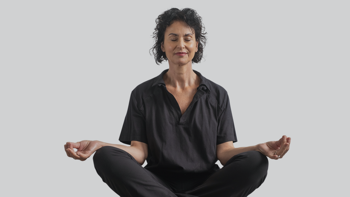 a woman meditating for body awareness